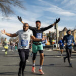 Coach Amp running Rock n Roll half marathon in DC